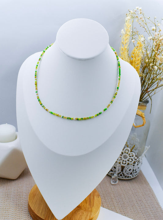 green beads necklace on a bust