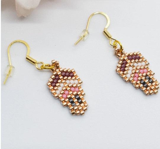 Beaded leaf earrings