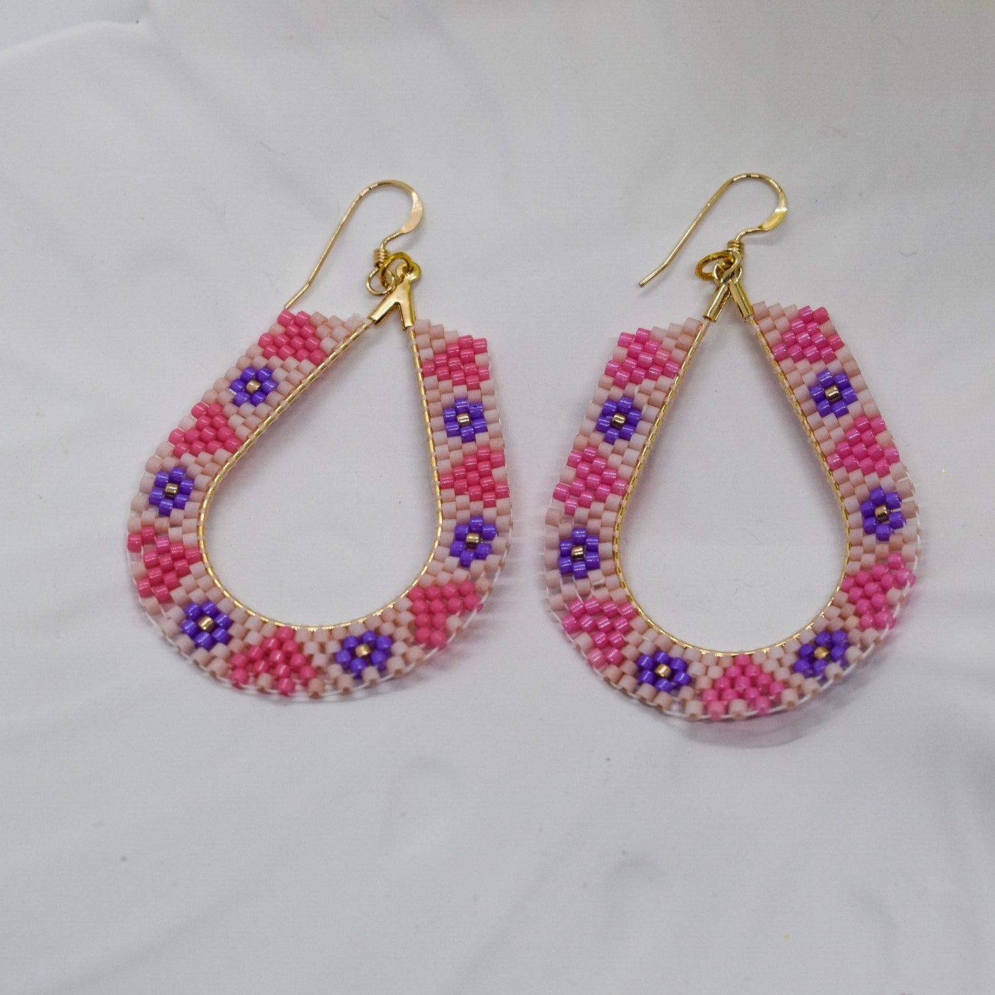 oval pink beaded earrings