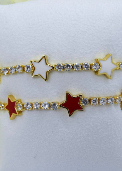 red and white stars and strass bracelets