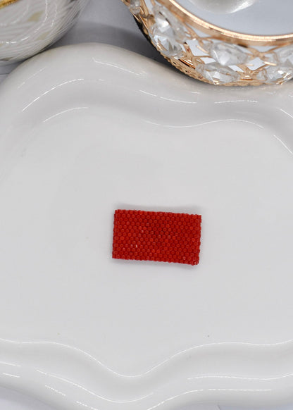 red beaded ring