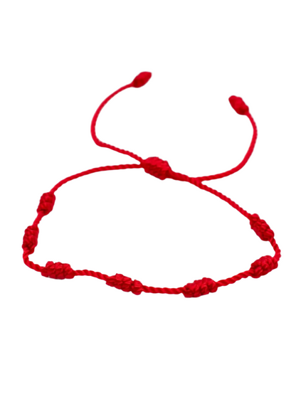 seven knots string lucky protection bracelet on white background