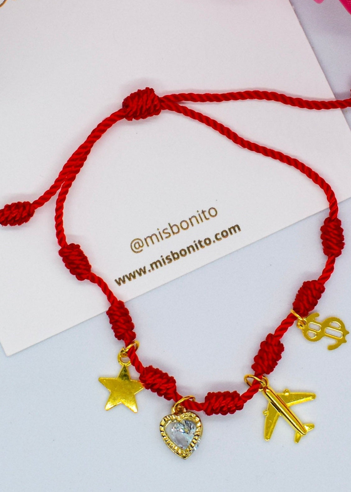 seven knots with heart charm