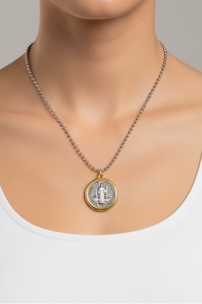 stbenedict medal necklace on a model