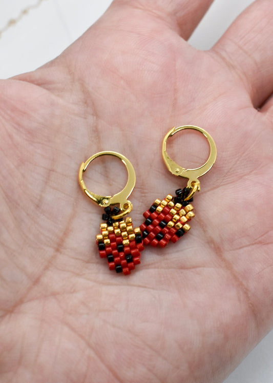 strawberry beaded earrings on hand
