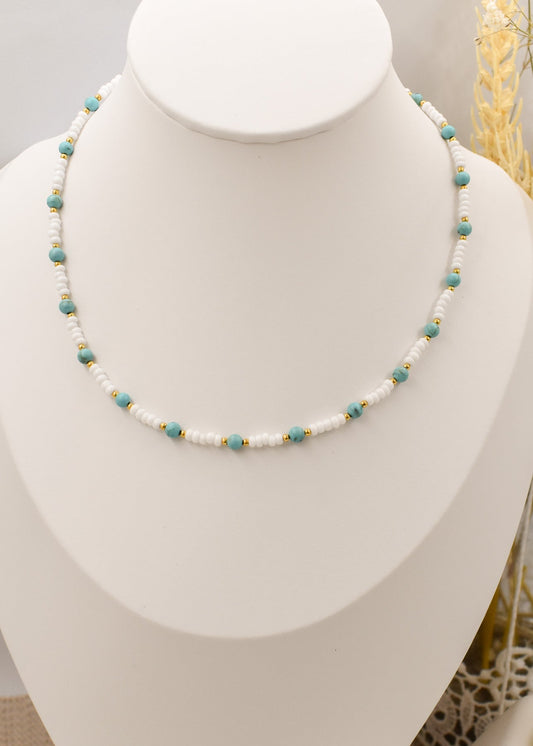 turquoise beaded necklace on a bust