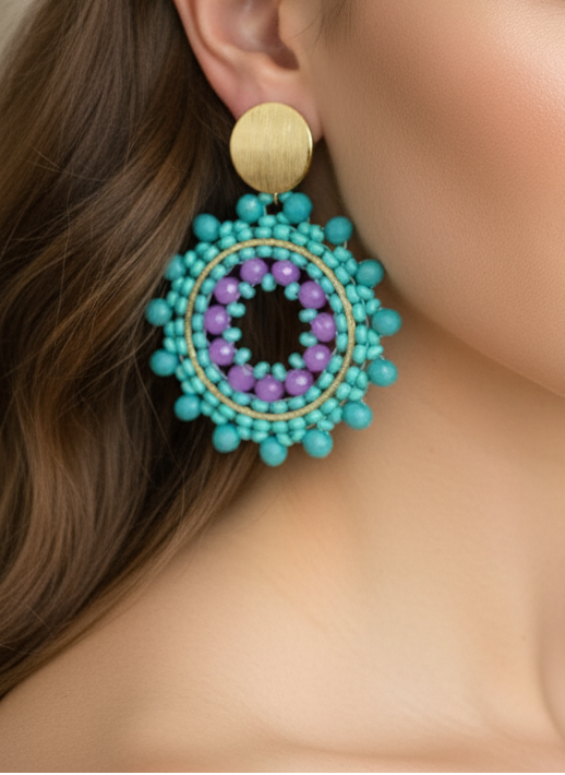 AI model wearing a turquoise and purple beaded earrings on a light surface with flowers.