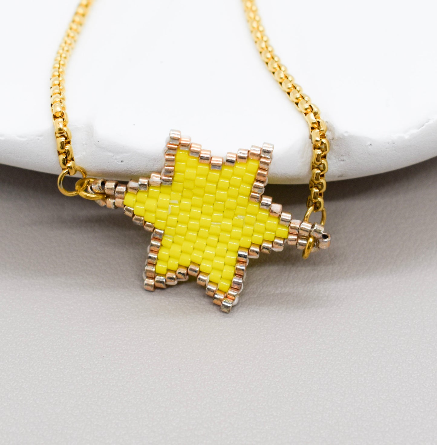 yellow star bracelet closeup